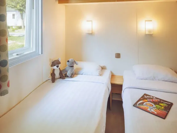 Seconda camera con due letti singoli del Roan Comfort Plus Lounge.