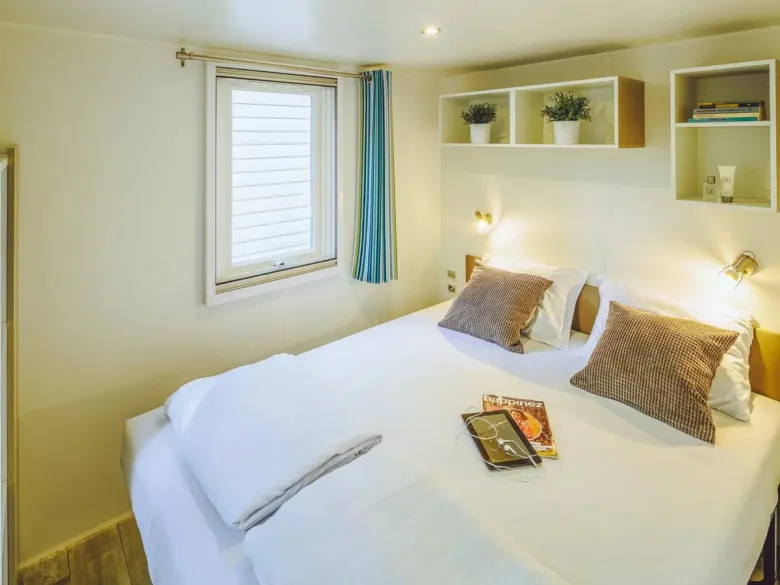Camera Roan Comfort Relax con letto matrimoniale.